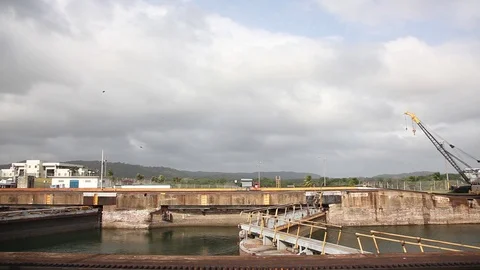 Time lapse view as gates of locks on the Panama Canal swing open and a Stock Footage 102240412