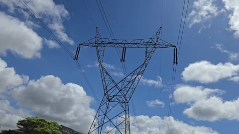 Time Lapse View of High Voltage Power Lines and Transmission Tower Set Against a 스톡 동영상 343751225