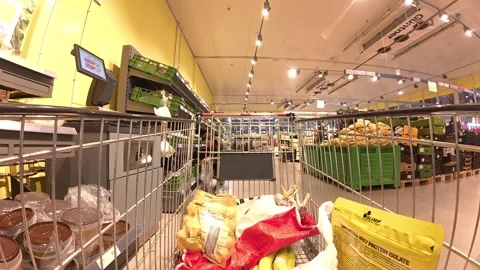 Time-lapse view from inside a shopping cart being pushed through aisles in .. Stock Footage 312139798