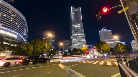 Time-lapse view at the junction with the city skyline in the background Stock Footage 146627388
