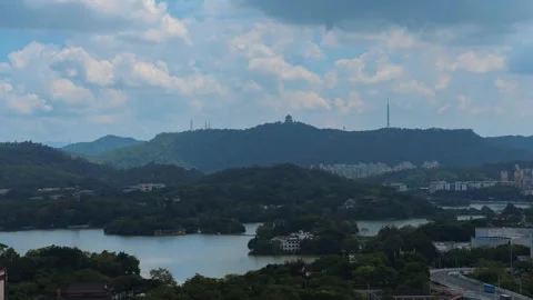 Time-lapse view of the lake area in a Chinese city Stock Footage 259681289