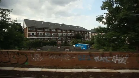 Time lapse view of London from moving train window 스톡 동영상 76386442