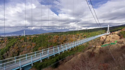 Time lapse view of the Mishima Skywalk Bridge Stock Footage 295734022