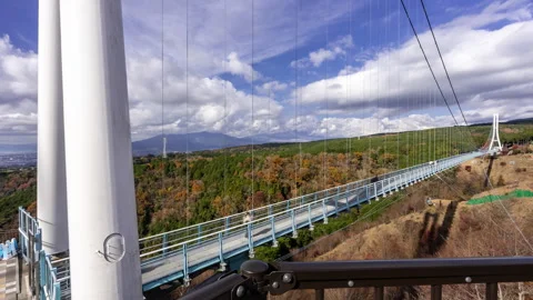 Time lapse view of the Mishima Skywalk Bridge Stock Footage 295734034
