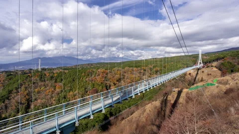 Time lapse view of the Mishima Skywalk Bridge Stock Footage 295734037