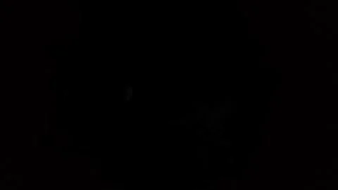 Time lapse view of the moon in a cloudy sky at night Stock Footage 335607328