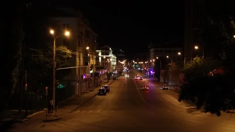 Time lapse view of a night street of a night city with driving cars, luminous Stock Footage 134932136