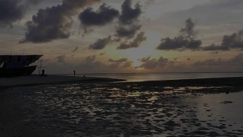 Time Lapse view old boat and sunrise in Maafushi, Maldives Stock Footage 77526832