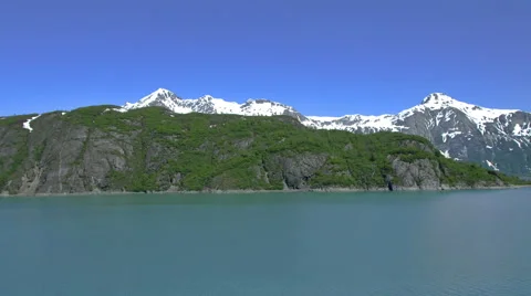 Time-lapse view passing by and around an island in a bay near Glacier Bay. Stock Footage 52215536