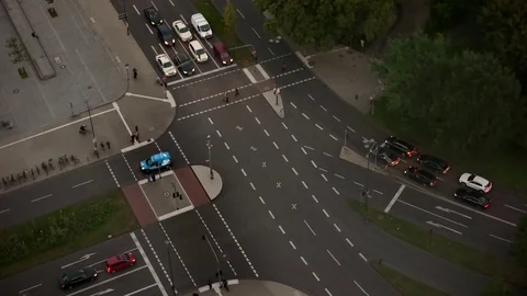 Time lapse view of people and traffic crossing busy intersection at the evening Stock Footage 85124845