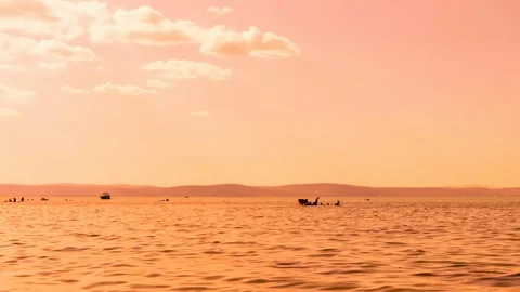 Time-lapse view on the people swimming and playing in the Balaton lake in Stock Footage 116200838