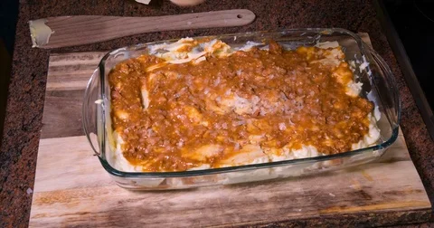 Time lapse view of the preparation of lasagne in bolognese sauce Stock Footage 74070414