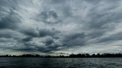 Time Lapse view of the river and the clouds running above it before the rain Stock Footage 130794757