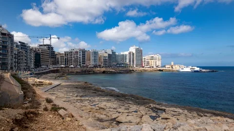 Time lapse view of the rocky beach in Sliema (Malta) Stock Footage 106393023