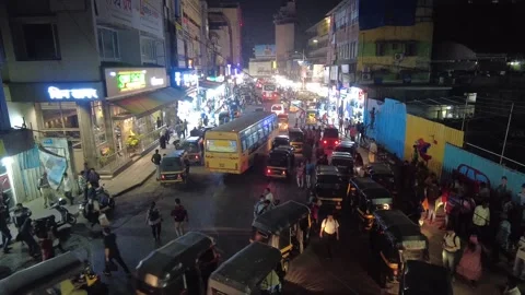 Time lapse view of rush hour traffic outside Thane Market. 4K Stock Footage 236464315