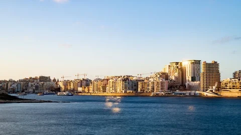 Time lapse view of the seafront of Sliema seen from Villetta, Malta at sunset Stock Footage 107199123