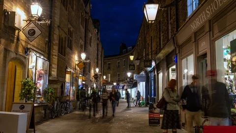 Time lapse view of a small busy lane in Cambridge at night Stock Footage 100664828