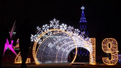 Time lapse view on sparkling night light on upcoming 2019 New Year alley at Stock Footage 100142155