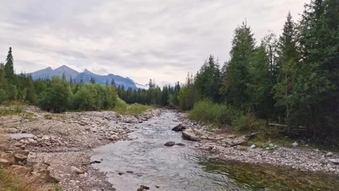 Time lapse. View of the Tatras mountains from the river Javorinka in the mi.. Stock Footage 252316771