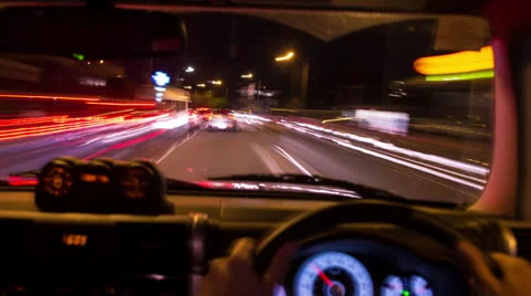 Time lapse of view through front window driving in city at night 135GYND PAL Video stock 26445046