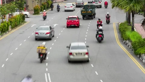 Time lapse view of traffic on road in George town, Malaysia. Stock Footage 132781650