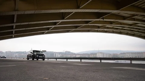 Time-lapse view on the traffic under the Margaret Bridge in Budapest, Hungary on Stock Footage 119957957