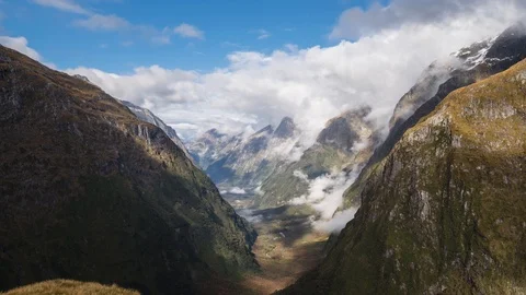 Time lapse view of valley landscape along the Milford Track at the Mackinnon Stock Footage 91253195