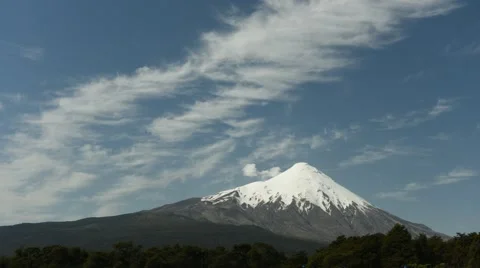 Time lapse view of wispy clouds over Osorno volcano in Chile Stock Footage