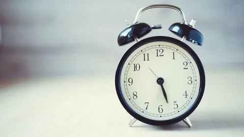 Time lapse Vintage background with retro alarm clock on table Stock Footage 83206149
