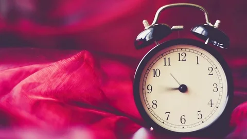 Time lapse Vintage background with retro alarm clock on table Stock Footage 83206152