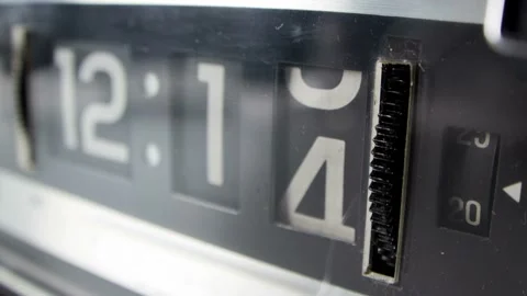 Time-Lapse of Vintage Flip Clock Displaying Time Stock Footage 331623343