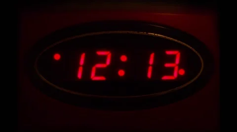 Time Lapse of Vintage Red Digital Clock running through Time Stock Footage 57361171