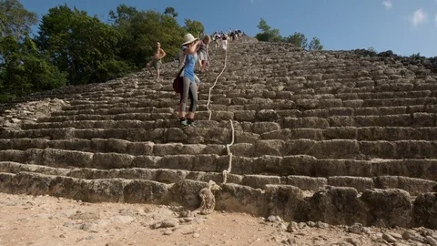 Time-Lapse of visitors climbing the Mayan Temple at the Coba Ruins, Mexico - 1 Stock Footage 84069627