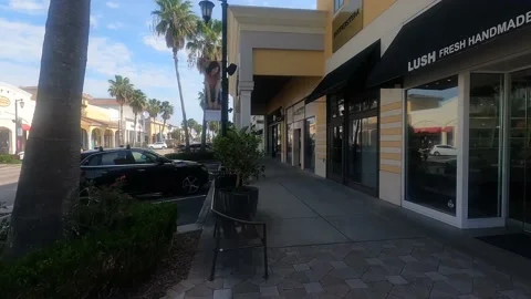 Time lapse of walking around outside shopping mall Stock Footage 156133646