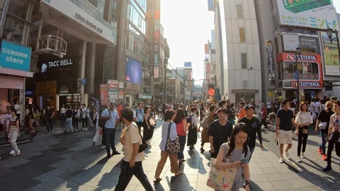 Time lapse walking through crowd in shopping area of Osaka, Japan in Asia Видео 116138594