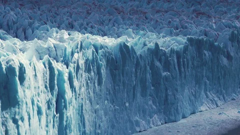 Time-lapse of a wall of glacier Stock Footage 129929474