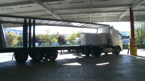 Time lapse of warehouse workers loading a truck for deliveries. Stock Footage 36727770