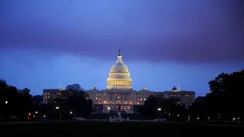 Time Lapse of Washington D.C. US Capitol Building Cars Traffic Jam Dusk to Night Stock Footage 98348369