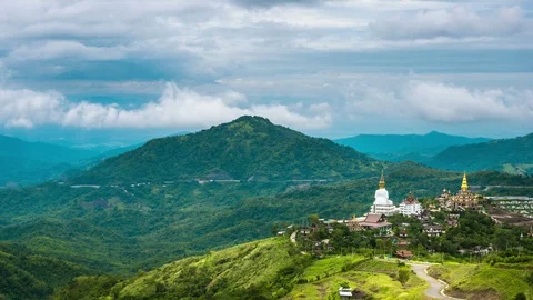 Time lapse ,Wat Prathat Phasornkaew Mountaintop Buddhist monastery and temple Stock Footage 94030641