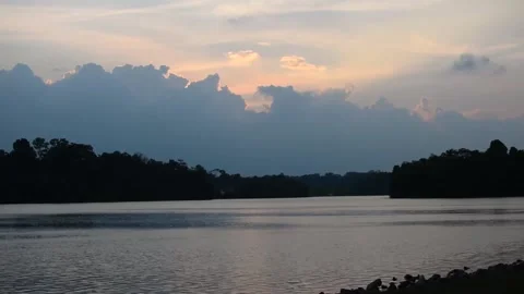 Time lapse of water and clouds at lower peirce reservoir Singapore Stock Footage 168398665
