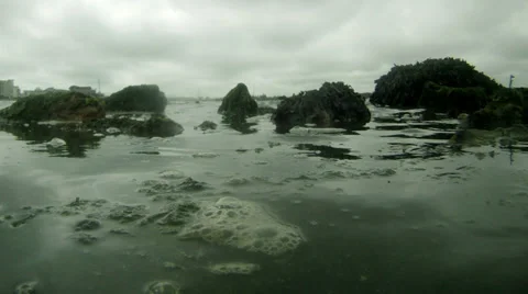 Time lapse water coming in rather dull day 02 Stock Footage 33899074