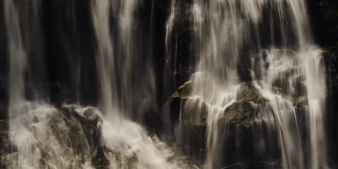 Time-lapse of water falling on the rocks at Whitewater falls in Western NC Stock Footage 103817141