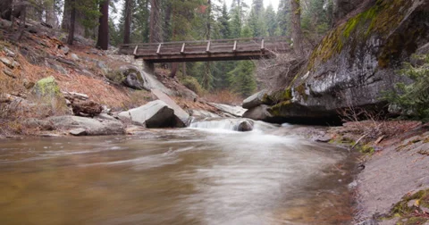 Time-Lapse of Water Going Under a Bridge Stock Footage 37810327