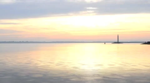 Time lapse with water landscape, lighthouse and sky at dawn Stock Footage 55550501