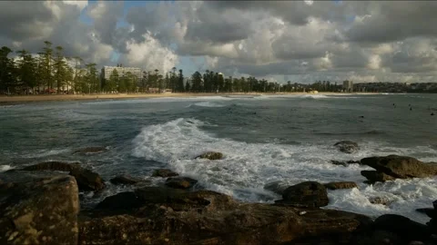Time lapse waves and dramatic clouds at Manly beach in Sydney 4K Stock Footage 307598911