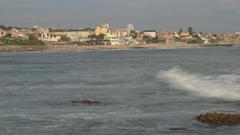 Time lapse of waves crashing overlooking Tamariz Beach in Estoril, including Stock Footage 96737705