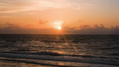 Time lapse of waves on sea during sunset Stock Footage 71567033