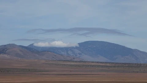 Time Lapse Of Wavy Lenticular Clouds Forming In Windy Tehachapi Mountains Stock Footage 125106799