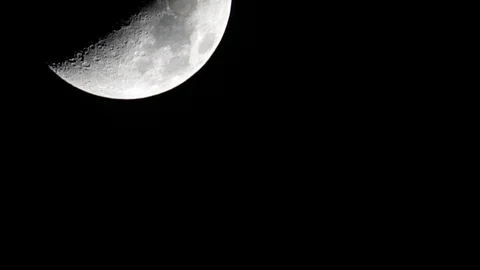 Time-lapse of a waxing crescent moon passing from top left to bottom right Stock Footage 126041622