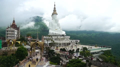 Time-lapse The white buddha statue wat phra that pha son kaew Phetchabun, Tha Vídeos de archivo 137391204